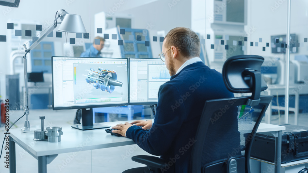 Poster Industrial Engineer Working on a Personal Computer, Two Monitor Screens Show CAD Software with 3D Prototype of Hybrid Electric Engine and Charts. Working Modern Factory.
