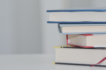 Books on the table. White background