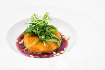 Deep fried crispy camembert cheese on the Trans-Siberian Railway, topped with a raspberry jam.