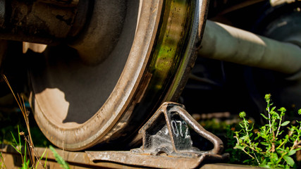 Closeup image of special stopper mechanism on railroad prevents wagons and trains roll