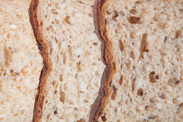 Slices of brown bread in a stack and close up