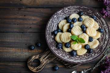 Lazy cottage cheese dumplings with fresh berry. Simple and healthy breakfast