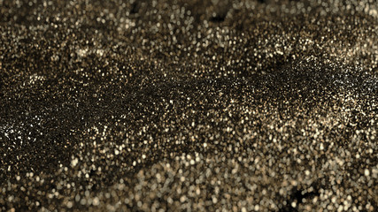 Golden Glitter particles with defocused blur background