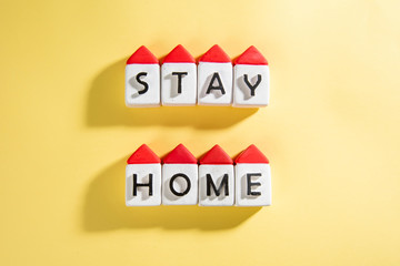 stay at home stay safe on yellow background