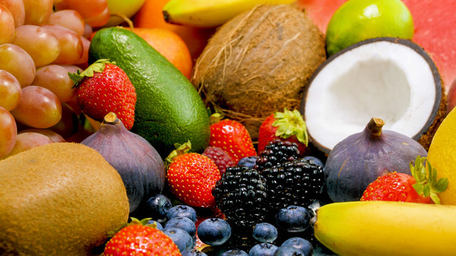 Beautiful image of big assortment of tropical and exotic fruits and berries