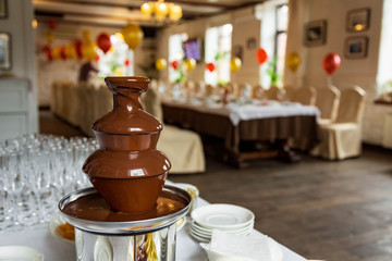Chocolate fountain, fondue in the banquet hall