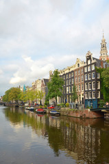 Fototapeta premium The canals of Amsterdam are a city symbol and of great cultural and historical value. In 2010 the canal ring area was added to the UNESCO World Heritage List.