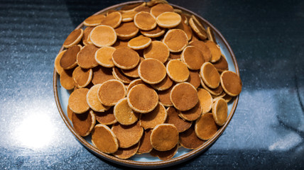 Traditional Dutch Mini Pancakes without any other ingredients with the black background