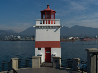 Fototapeta na wymiar View of lighthouse, Stanley Park Seawall Walk, Stanley Park, Vancouver, Lower Mainland, British Columbia, Canada