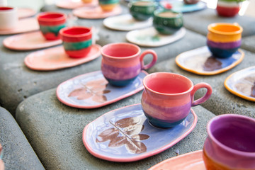 colorful handmade ceramic coffee cups	