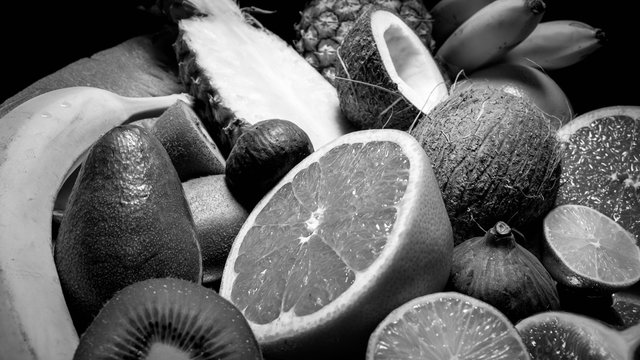 Black and white image of exotic tropical fruits. concept of healthy nutrition