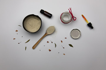 Face mask with bentonite clay and essential oils, herbs and aromatherapy for relaxation and face skin detox