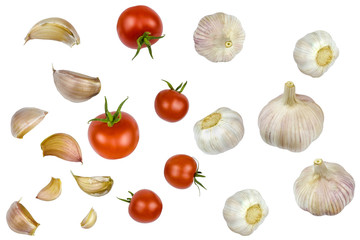 Collage of fresh tomatoes and garlic isolated on a white background.