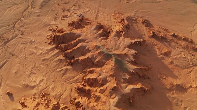 Aerial view of Flaming Cliffs in Bayanzag valley. Mongolia, Gobi desert.