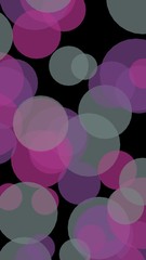 Multicolored translucent circles on a dark background. 3D illustration