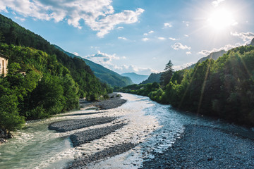 A picturesque landscape view of the valley of Var river in the Alps mountains on a sunny day...