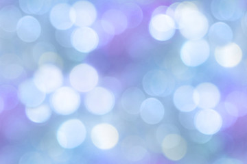 Light abstract blurry blue bokeh background.