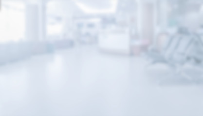 Fototapeta na wymiar Abstract white blurred background bright light, interior modern hospital