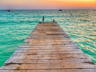 Fototapeta premium Beautiful pier at sunset in a paradise island in Cambodia