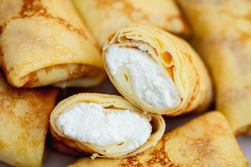 Tasty Pancakes filled with curd filling