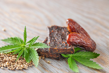 Chocolate protein bar with hemp seeds and dates. Healthy vegan food