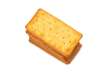 Cracker with salt isolated on white.