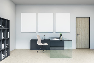 Luxury director's office with three blank billboards