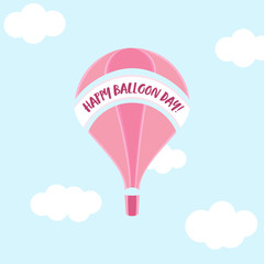 Happy Montgolfier day. Pink balloon in the blue sky.