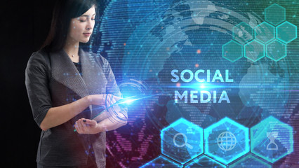 Business, Technology, Internet and network concept. Young businessman working on a virtual screen of the future and sees the inscription: Social media