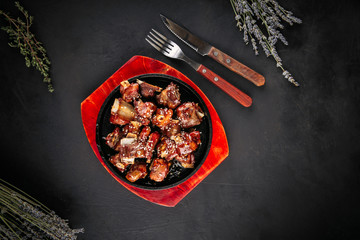 Top view on teriaki sauce beef ribs in a pan