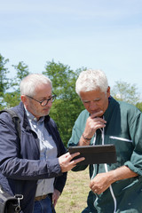 Farmer meeting with financial counseller in farm