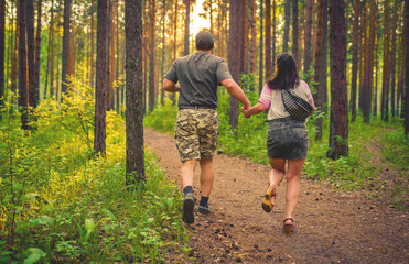 couple walking in the forest