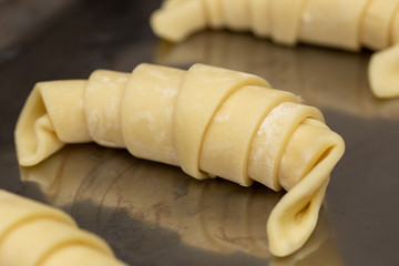 shaping the croissant dough