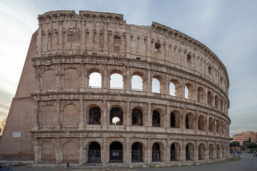 Fototapeta na wymiar Colosseum ruins in Rome. It is the greatest roman building in the world.