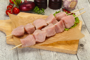 Raw pork meat skewer for grill