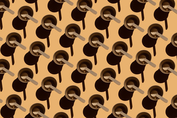 Fototapeta premium Disposable recyclable tableware, eco tableware with hard shadows on a beige background, pattern of repeating paper cup and spoon
