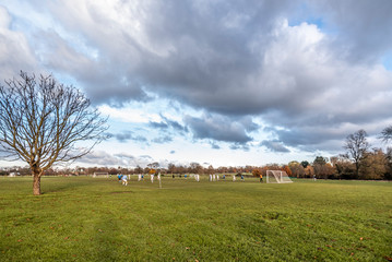 Playing soccer in the park