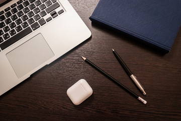 Notebook, pen, pencil and notebook on the table. Remote work.