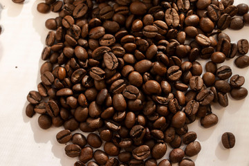 coffee beans a lot of coffee scattered on a white background
