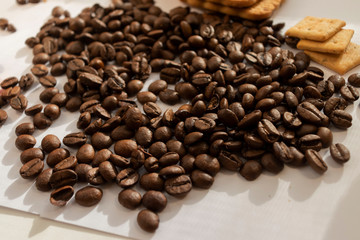 large cookies roasted coffee beans on a white background