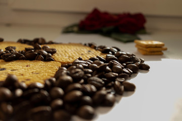 Breakfast coffee cookies morning still life background coffee grain on a white background flowers roses