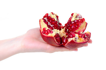 Hand holding fresh pomegranate on white background isolation