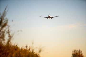 Fototapeta na wymiar Plane landing at El Prat airport, Barcelona.