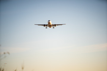 Fototapeta na wymiar Plane landing at El Prat airport, Barcelona.