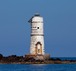 the lighthouse of the boat eater of calasetta, south sardinia, on a beautiful summer day