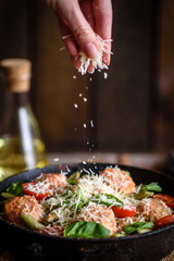 Obraz na płótnie Canvas Delicious fresh pasta with meatballs, sauce, cherry tomatoes and basil