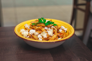 Pasta salad with cheese and tomatoes