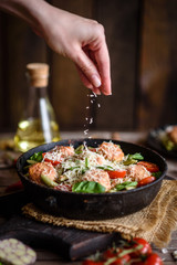 Delicious fresh pasta with meatballs, sauce, cherry tomatoes and basil