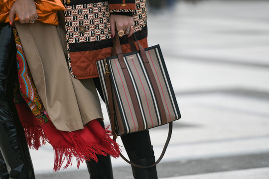 Paris, France - February 29, 2020: Burberry striped handbag detail - streetstylefw20