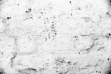 Texture of a concrete wall with cracks and scratches which can be used as a background